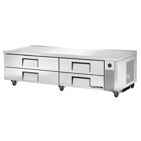 Stainless steel refrigerated chef base with four drawers on wheels from True Refrigeration