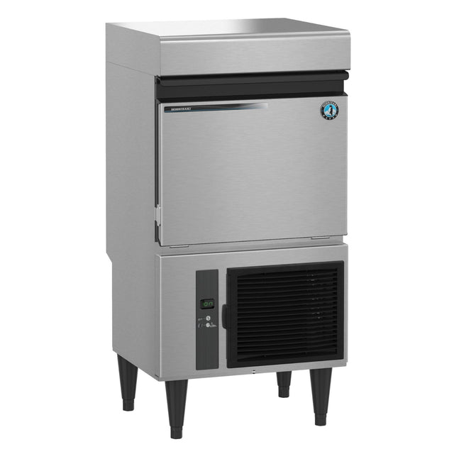 Stainless steel Hoshizaki IM-50BAA-LM ice maker with storage bin and black base legs