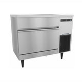 Stainless steel Hoshizaki IM-200BAC undercounter ice maker with storage bin on legs