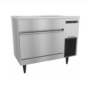 Stainless steel Hoshizaki IM-200BAC undercounter ice maker with storage bin on legs