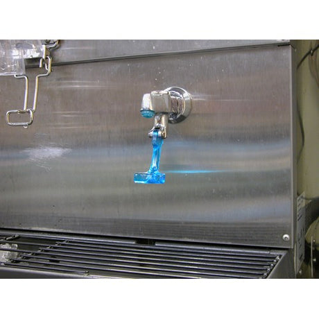 Bright blue liquid stream flowing from a metal spout of Ice-O-Matic water glass filler