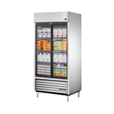 Commercial True Refrigeration TSD-33G-HC-LD with glass sliding doors stocked with beverages