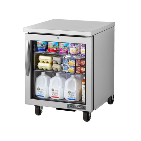 Stainless steel undercounter refrigerator with framed glass door showcasing dairy products and beverages