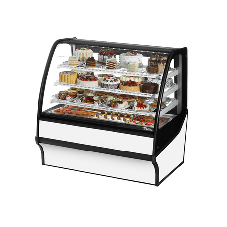 Curved-glass refrigerated bakery display case filled with cakes in True Refrigeration Display Merchandiser