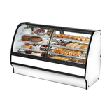 Curved glass refrigerated display case showcasing pastries in True Refrigeration Dual Zone glass merchandiser